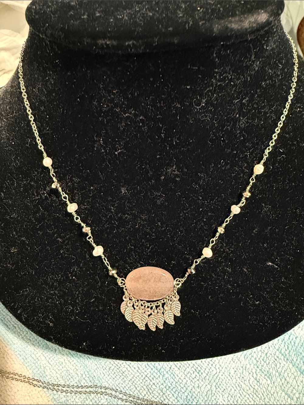 Bohemian stone necklace with silver feather dangles